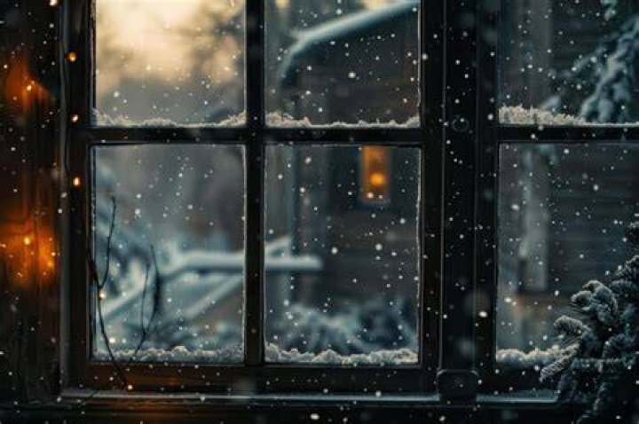 Snow is gently falling outside the window lyrics